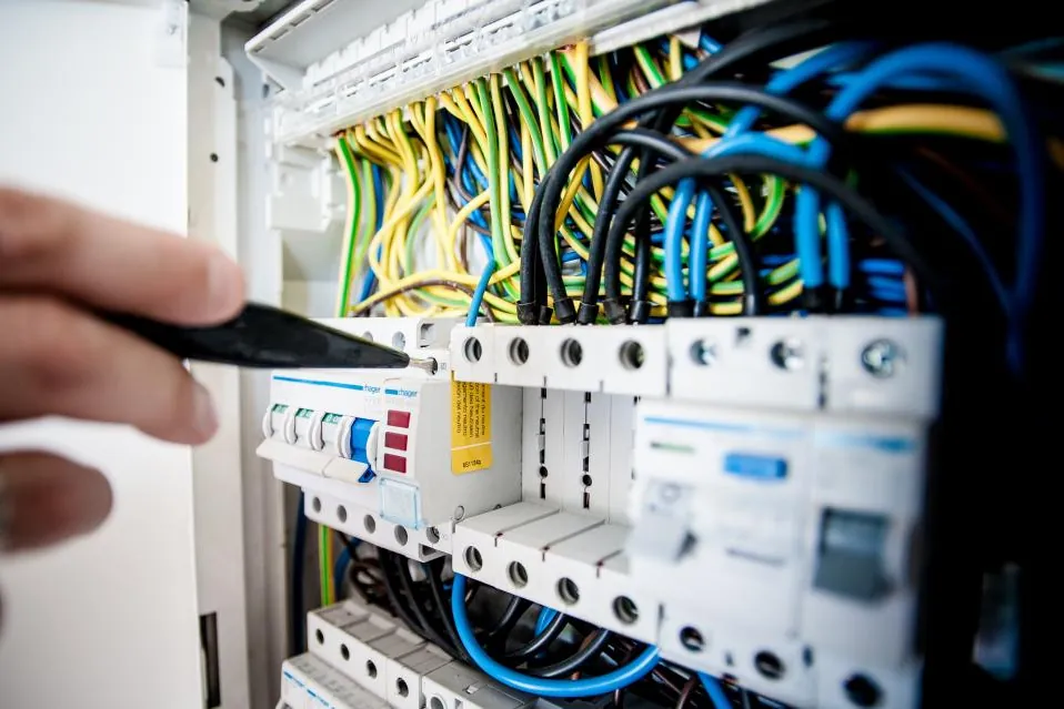 Electrician testing a consumer unit