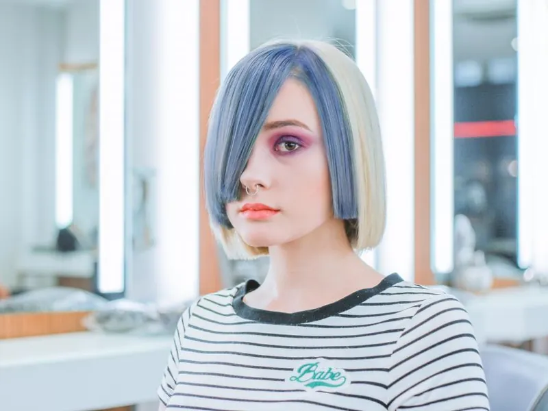 Client with a fresh colour in a modern hair salon