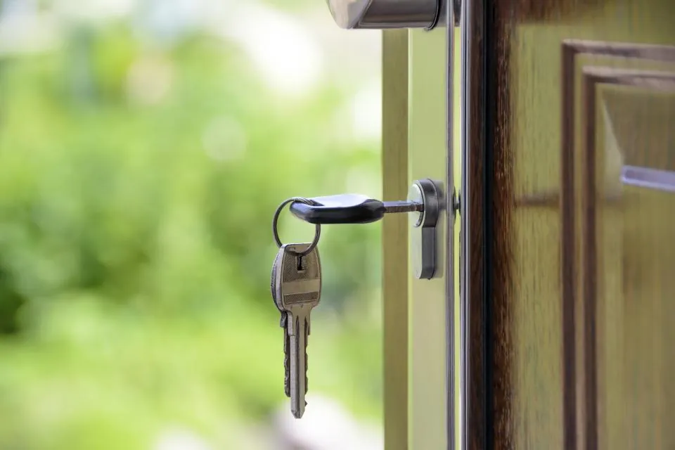 Key in the lock of a front door