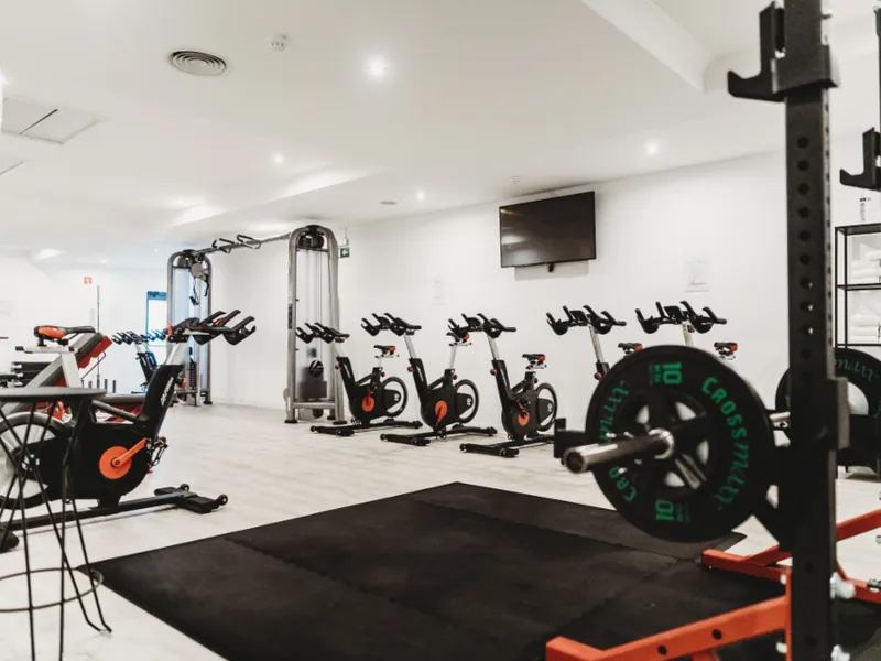 Gym with bikes, racks and weights