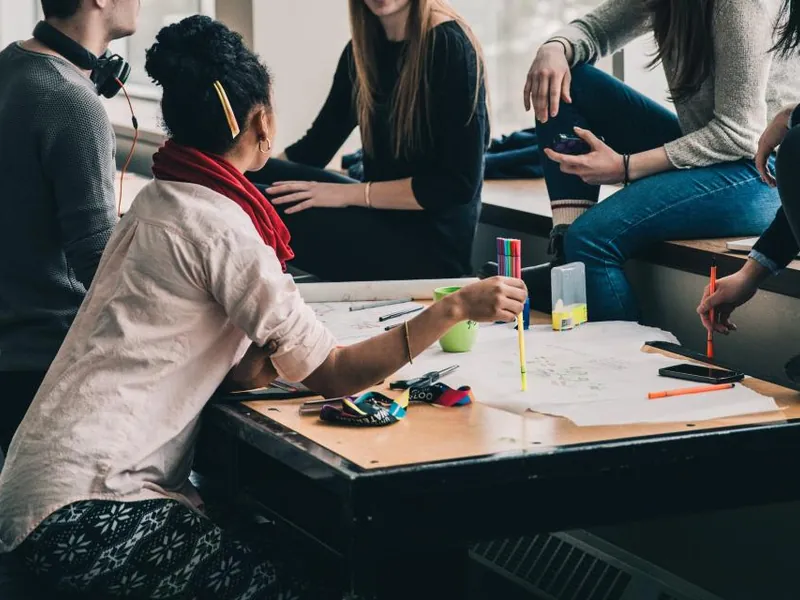 Students studying together around a table